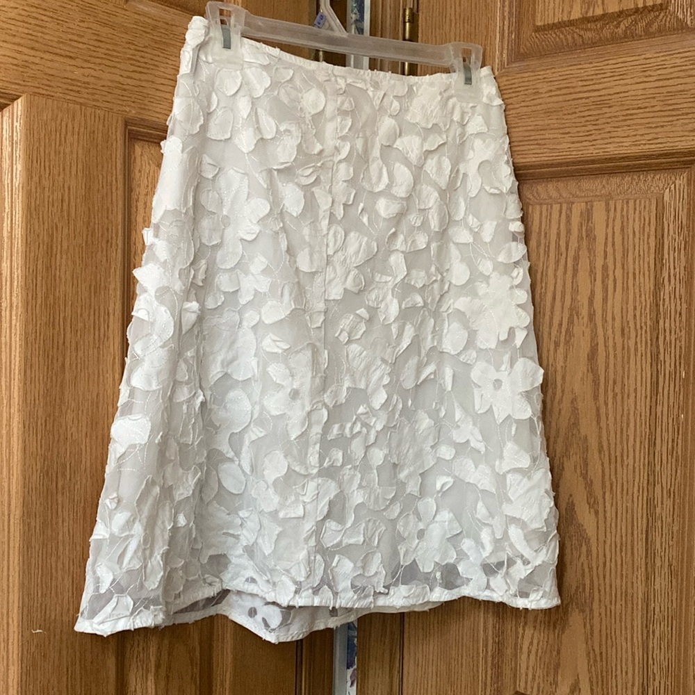 Appliqué patch skirt.